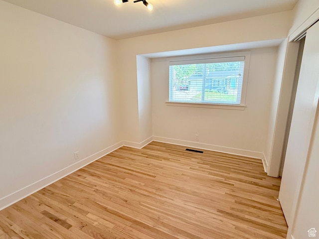 573 E 1600 S, Bountiful, UT 84010 - empty room featuring light wood-style flooring and baseboards