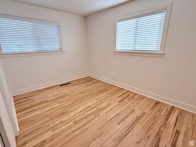 573 E 1600 S, Bountiful, UT 84010 - spare room with light wood-type flooring and baseboards