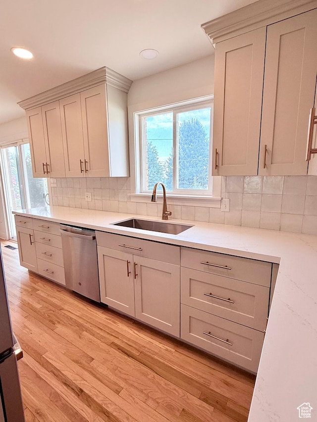 573 E 1600 S, Bountiful, UT 84010 - kitchen featuring stainless steel dishwasher, a sink, light wood-style floors, plenty of natural light, and recessed lighting