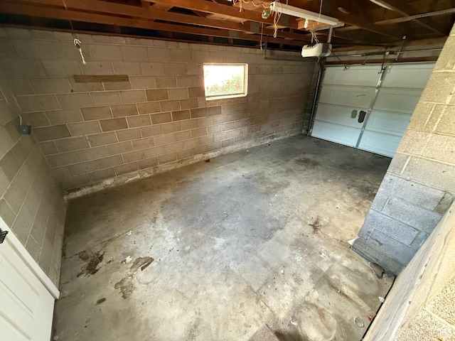 573 E 1600 S, Bountiful, UT 84010 - garage with a garage door opener and concrete block wall