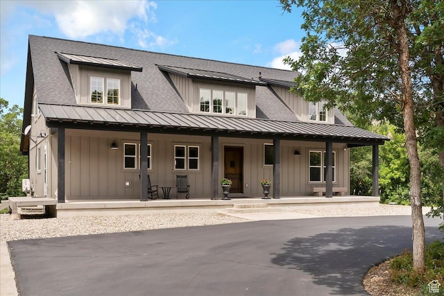 145 N 10450 E, Huntsville, UT 84317 - back of house with covered porch, a standing seam roof, board and batten siding, roof with shingles, and metal roof