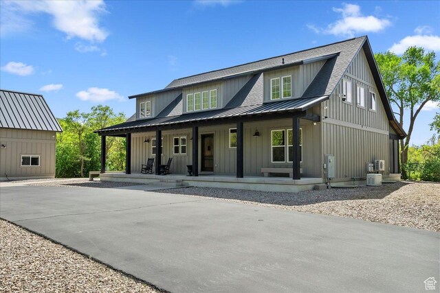 145 N 10450 E, Huntsville, UT 84317 - view of front of property with a porch, board and batten siding, a standing seam roof, and metal roof