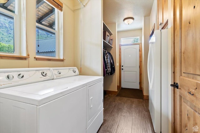 145 N 10450 E, Huntsville, UT 84317 - washroom featuring washer and clothes dryer, dark wood-style floors, and baseboards