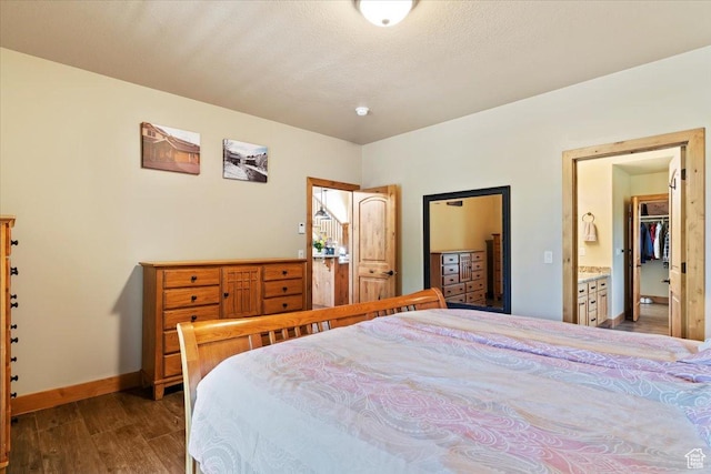 145 N 10450 E, Huntsville, UT 84317 - bedroom with wood finished floors, baseboards, and ensuite bath