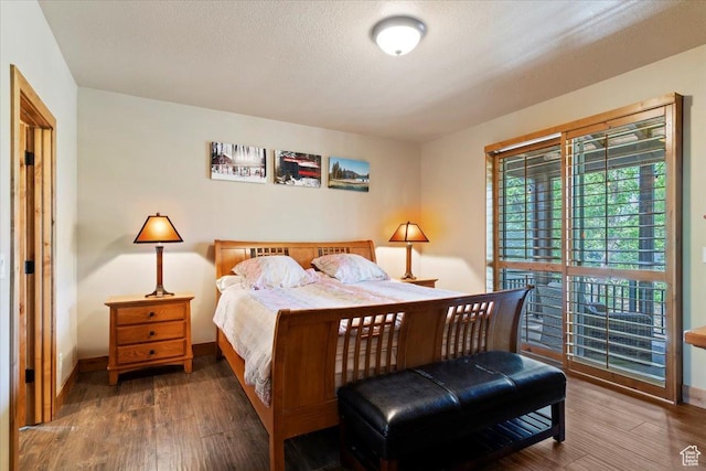 145 N 10450 E, Huntsville, UT 84317 - bedroom featuring wood finished floors and baseboards