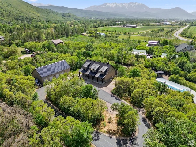 145 N 10450 E, Huntsville, UT 84317 - aerial view of a mountainous background and a heavily wooded area
