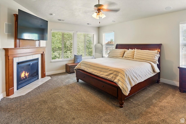 1926 N 1420 W, Provo, UT 84604 - carpeted bedroom with a fireplace, baseboards, and a ceiling fan