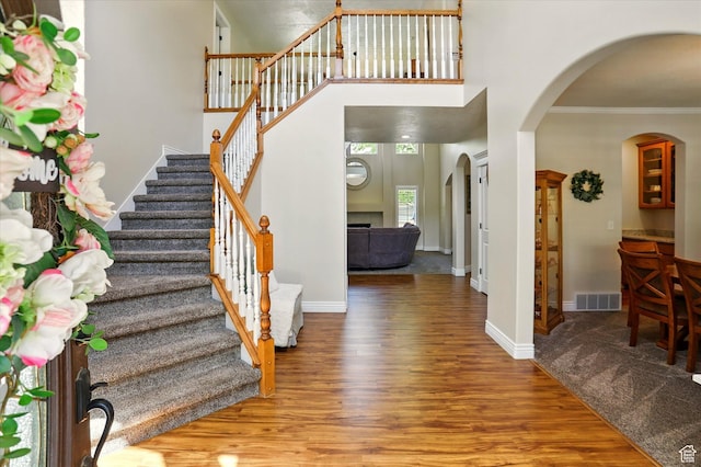 1926 N 1420 W, Provo, UT 84604 - foyer entrance with ornamental molding, wood finished floors, stairway, arched walkways, and baseboards