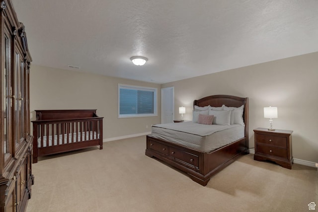 6192 W Ridge Rd, Highland, UT 84003 - bedroom with light colored carpet, baseboards, and a textured ceiling