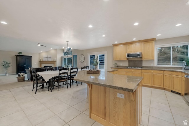 6192 W Ridge Rd, Highland, UT 84003 - kitchen featuring appliances with stainless steel finishes, open floor plan, light brown cabinets, recessed lighting, and a center island