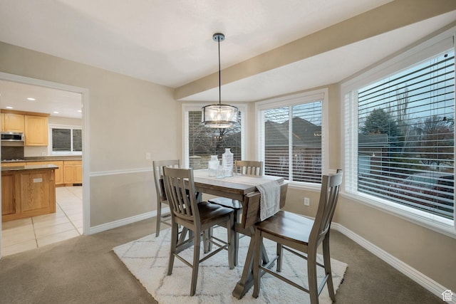 6192 W Ridge Rd, Highland, UT 84003 - dining space featuring light carpet and baseboards
