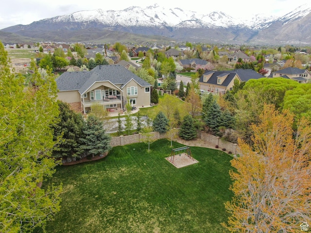 6192 W Ridge Rd, Highland, UT 84003 - aerial perspective of suburban area with a mountainous background