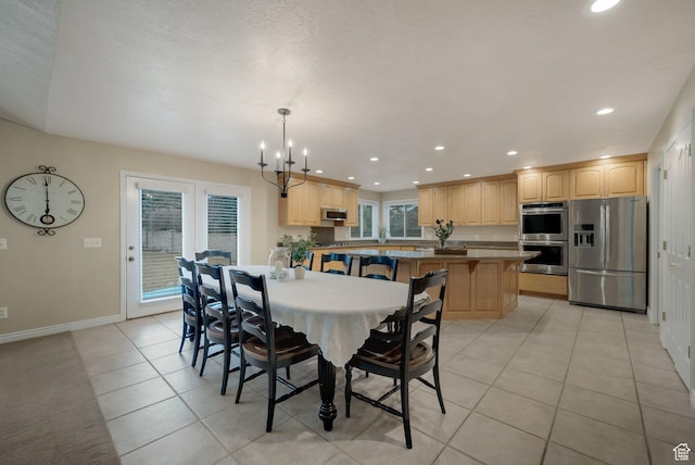 6192 W Ridge Rd, Highland, UT 84003 - dining area with recessed lighting, baseboards, a chandelier, and light tile patterned flooring