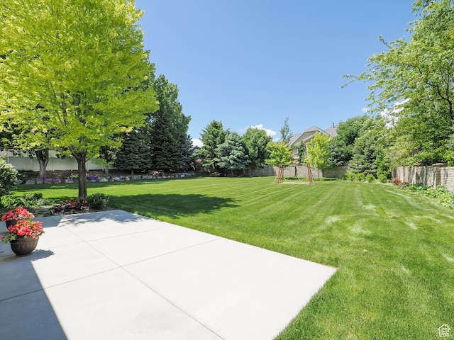 6192 W Ridge Rd, Highland, UT 84003 - view of yard featuring a patio area