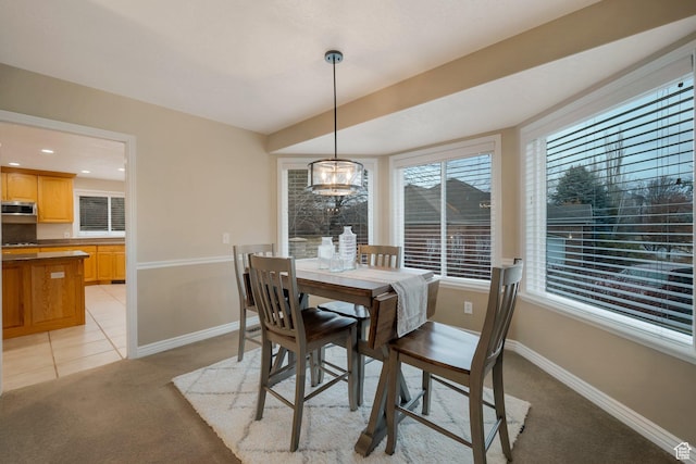 6192 W Ridge Rd, Highland, UT 84003 - dining area with light colored carpet and baseboards