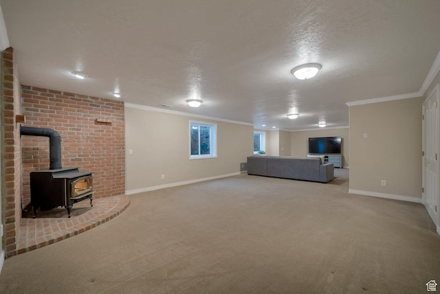 6192 W Ridge Rd, Highland, UT 84003 - unfurnished living room featuring carpet flooring, a wood stove, crown molding, baseboards, and a textured ceiling