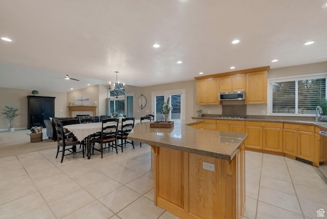 6192 W Ridge Rd, Highland, UT 84003 - kitchen featuring stainless steel appliances, open floor plan, recessed lighting, dark stone counters, and a kitchen island