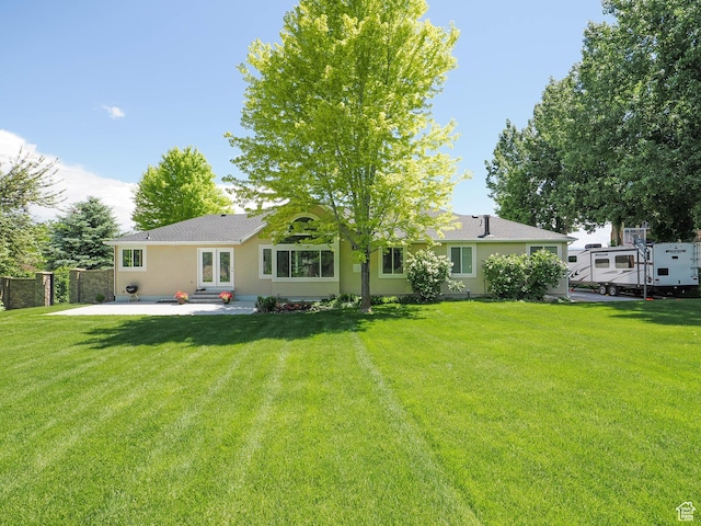 6192 W Ridge Rd, Highland, UT 84003 - rear view of house featuring a patio and stucco siding