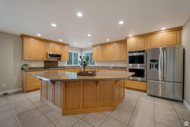 6192 W Ridge Rd, Highland, UT 84003 - kitchen with appliances with stainless steel finishes, a center island, recessed lighting, light tile patterned flooring, and baseboards