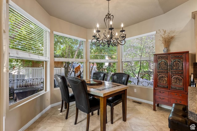 1111 E Bench View Dr, Ogden, UT 84404 - dining room featuring baseboards, a chandelier, and light tile patterned flooring