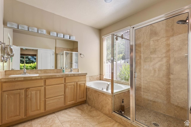 1111 E Bench View Dr, Ogden, UT 84404 - bathroom with a stall shower, healthy amount of natural light, tile patterned flooring, and a garden tub