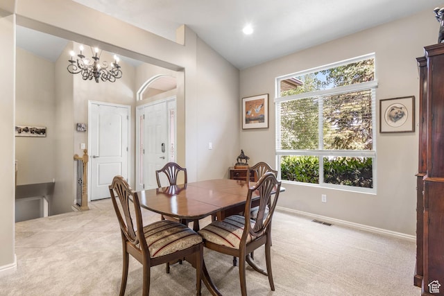 1111 E Bench View Dr, Ogden, UT 84404 - dining room featuring vaulted ceiling, light carpet, baseboards, and a chandelier
