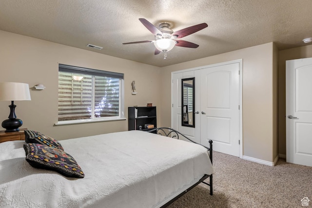 1111 E Bench View Dr, Ogden, UT 84404 - bedroom with a textured ceiling, carpet, ceiling fan, and baseboards
