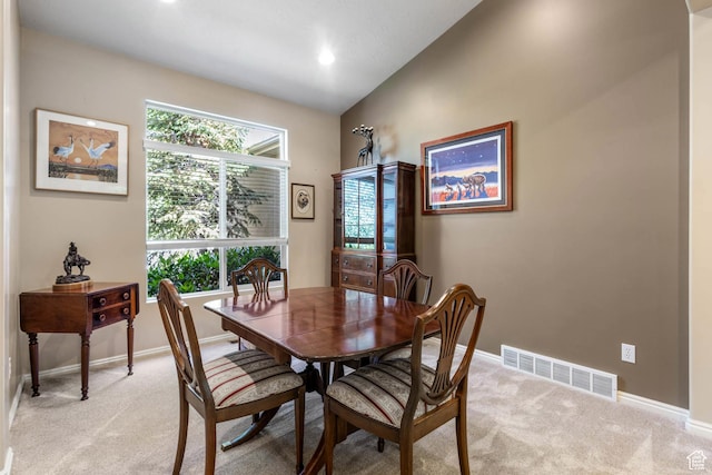 1111 E Bench View Dr, Ogden, UT 84404 - dining space featuring light colored carpet, baseboards, recessed lighting, and lofted ceiling