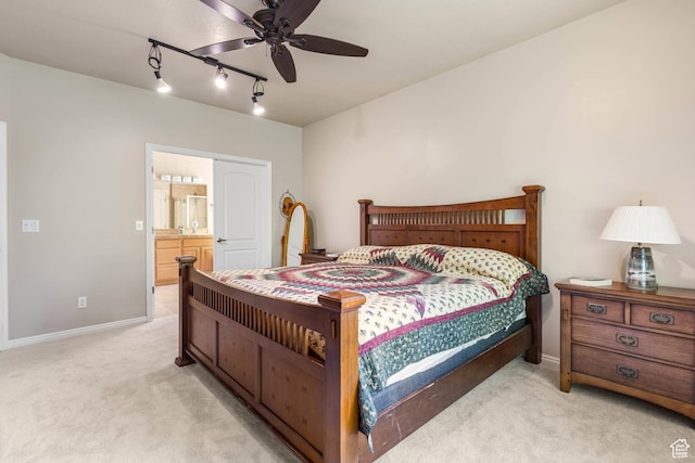 1111 E Bench View Dr, Ogden, UT 84404 - bedroom with carpet floors, track lighting, ensuite bath, baseboards, and a ceiling fan