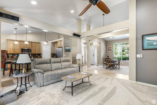 1111 E Bench View Dr, Ogden, UT 84404 - living area with light carpet, ceiling fan, lofted ceiling, recessed lighting, and baseboards
