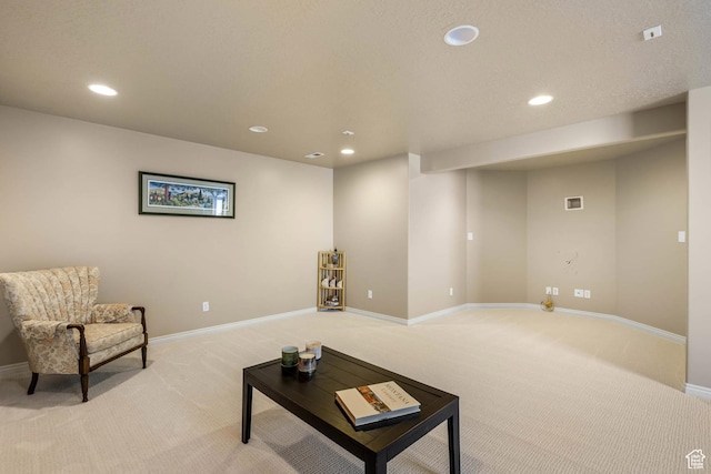 1111 E Bench View Dr, Ogden, UT 84404 - living area with light colored carpet, recessed lighting, and baseboards