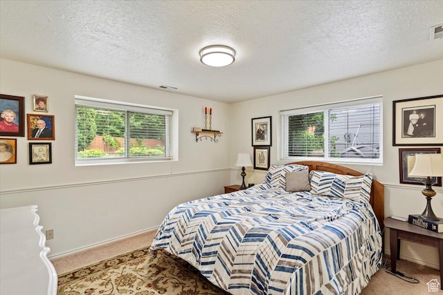 3272 N 175 W, North Ogden, UT 84414 - carpeted bedroom with a textured ceiling and baseboards