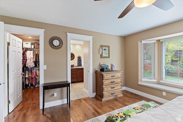 3272 N 175 W, North Ogden, UT 84414 - bedroom with a walk in closet, light wood-style floors, baseboards, ensuite bath, and a closet