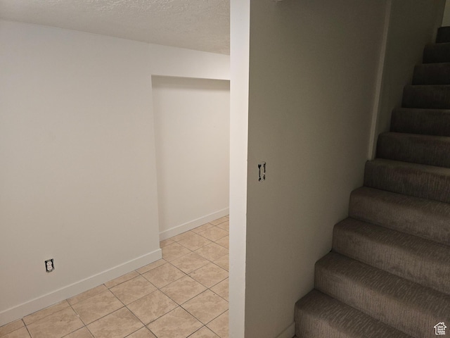 530 E 31st St, Ogden, UT 84403 - stairway with tile patterned flooring and baseboards