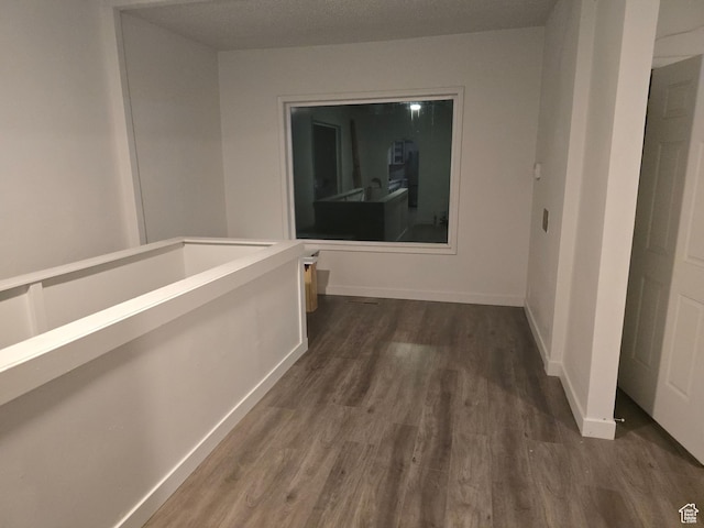 530 E 31st St, Ogden, UT 84403 - corridor with dark wood-style flooring and baseboards