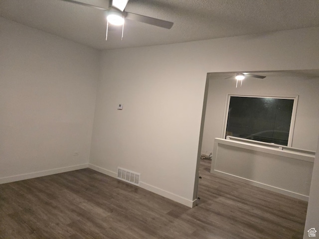 530 E 31st St, Ogden, UT 84403 - unfurnished room featuring ceiling fan, wood finished floors, baseboards, and a textured ceiling