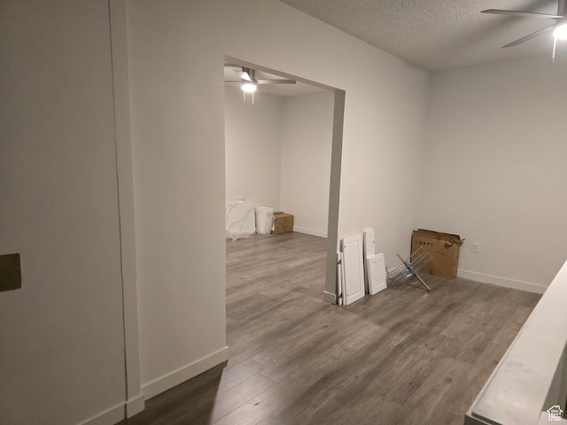 530 E 31st St, Ogden, UT 84403 - unfurnished room with a ceiling fan, dark wood-style floors, a textured ceiling, and baseboards