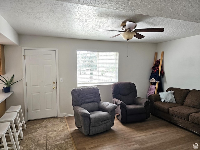 506 E 670 N, Tooele, UT 84074 - living area with a ceiling fan, wood finished floors, and a textured ceiling