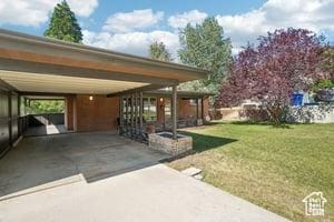 3525 E Ceres Dr S, Millcreek, UT 84124 - view of parking / parking lot featuring driveway and a carport