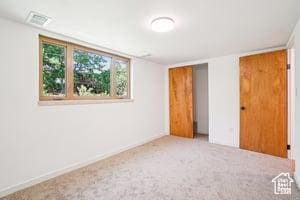 3525 E Ceres Dr S, Millcreek, UT 84124 - unfurnished bedroom with carpet, baseboards, and a closet