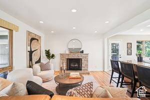 3525 E Ceres Dr S, Millcreek, UT 84124 - living room featuring a fireplace, recessed lighting, and wood finished floors