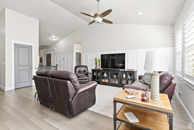 88 N Parkside Loop W, Elk Ridge, UT 84651 - living area with a ceiling fan, vaulted ceiling, light wood-style flooring, and baseboards