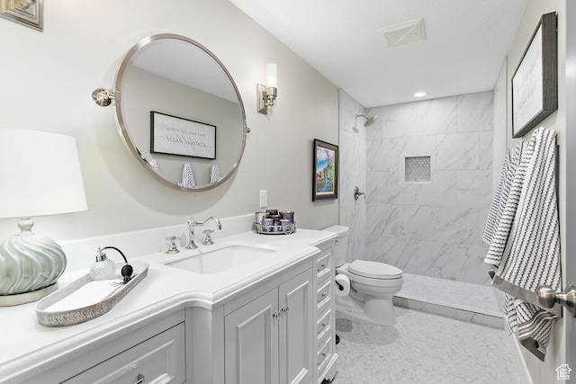 88 N Parkside Loop W, Elk Ridge, UT 84651 - bathroom featuring toilet, vanity, tiled shower, and recessed lighting