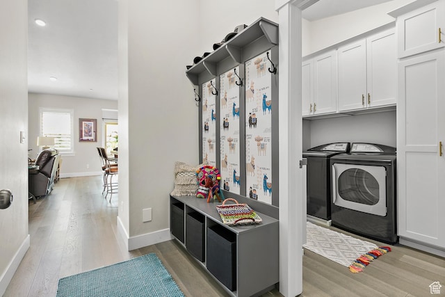 88 N Parkside Loop W, Elk Ridge, UT 84651 - mudroom with washer and clothes dryer, light wood-type flooring, baseboards, and recessed lighting