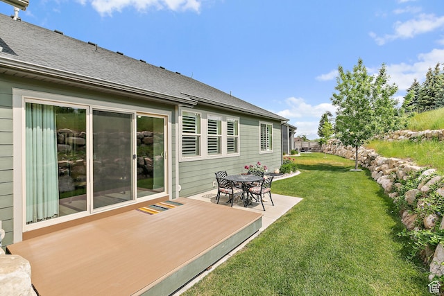 88 N Parkside Loop W, Elk Ridge, UT 84651 - view of green lawn with a deck