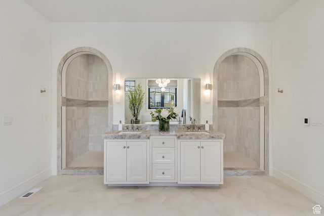 423 S 150 E, Mapleton, UT 84664 - full bathroom with double vanity, tiled shower, a chandelier, and tile patterned flooring