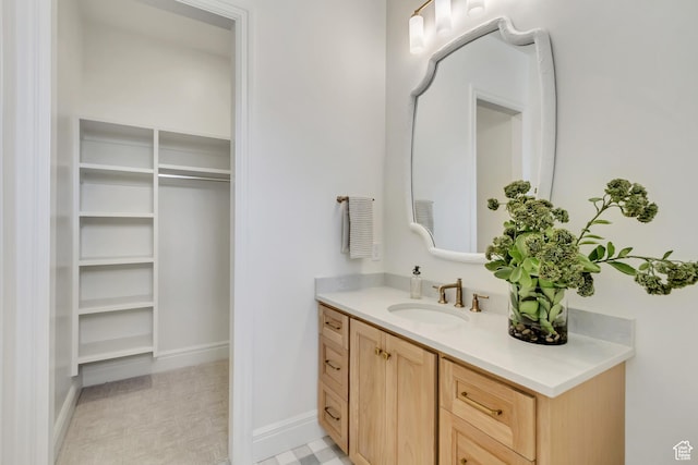 423 S 150 E, Mapleton, UT 84664 - bathroom with vanity and a walk in closet