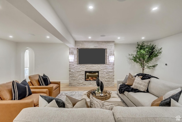 423 S 150 E, Mapleton, UT 84664 - living area with recessed lighting, arched walkways, wood finished floors, and a fireplace