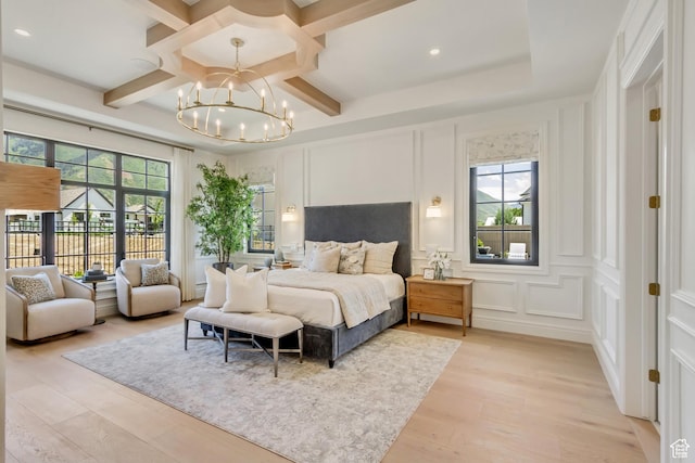 423 S 150 E, Mapleton, UT 84664 - bedroom with a decorative wall, coffered ceiling, a chandelier, light wood-type flooring, and beam ceiling