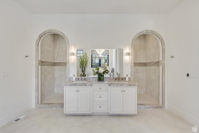423 S 150 E, Mapleton, UT 84664 - full bathroom featuring double vanity, a chandelier, and a tile shower